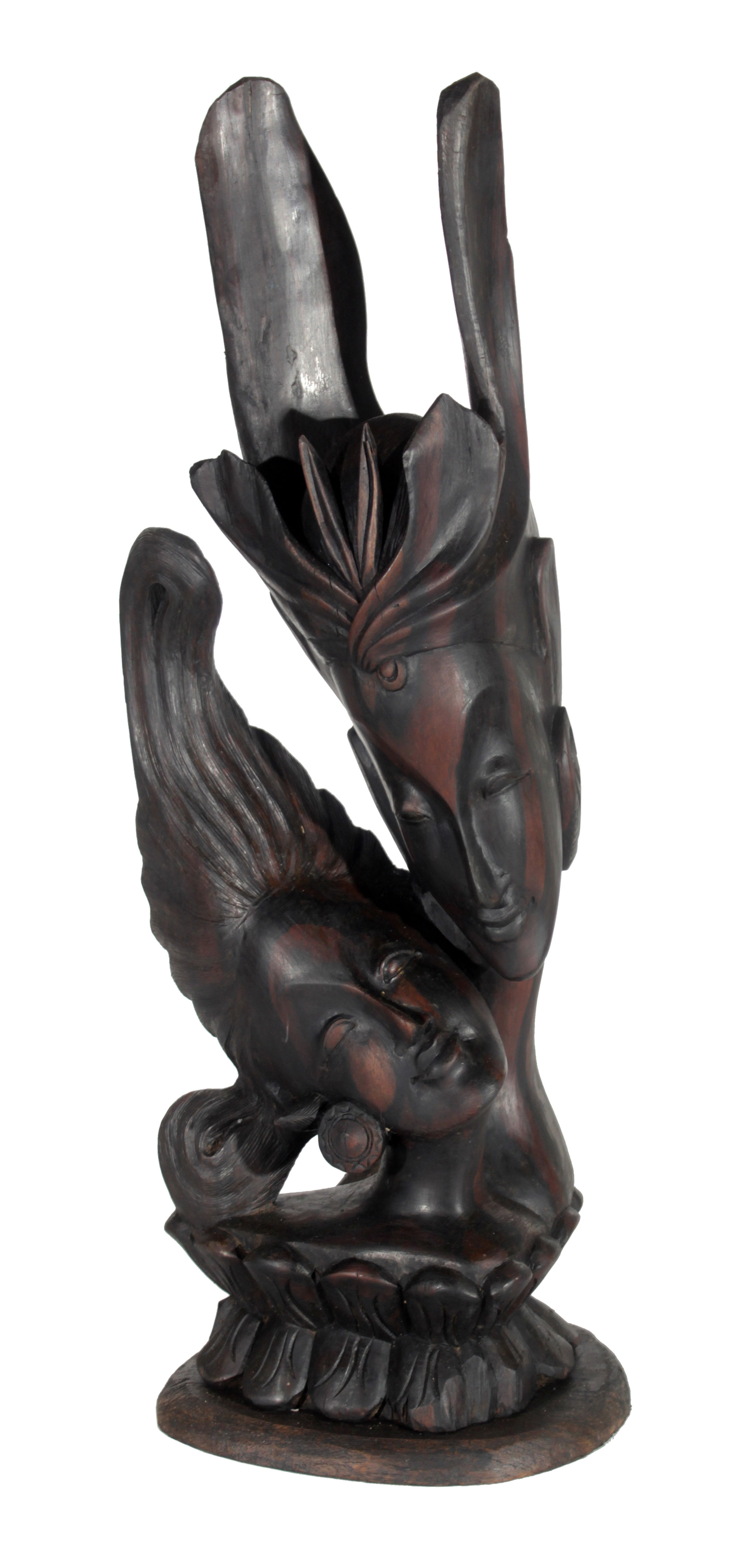 A Balinese amorous couple wooden sculpture.