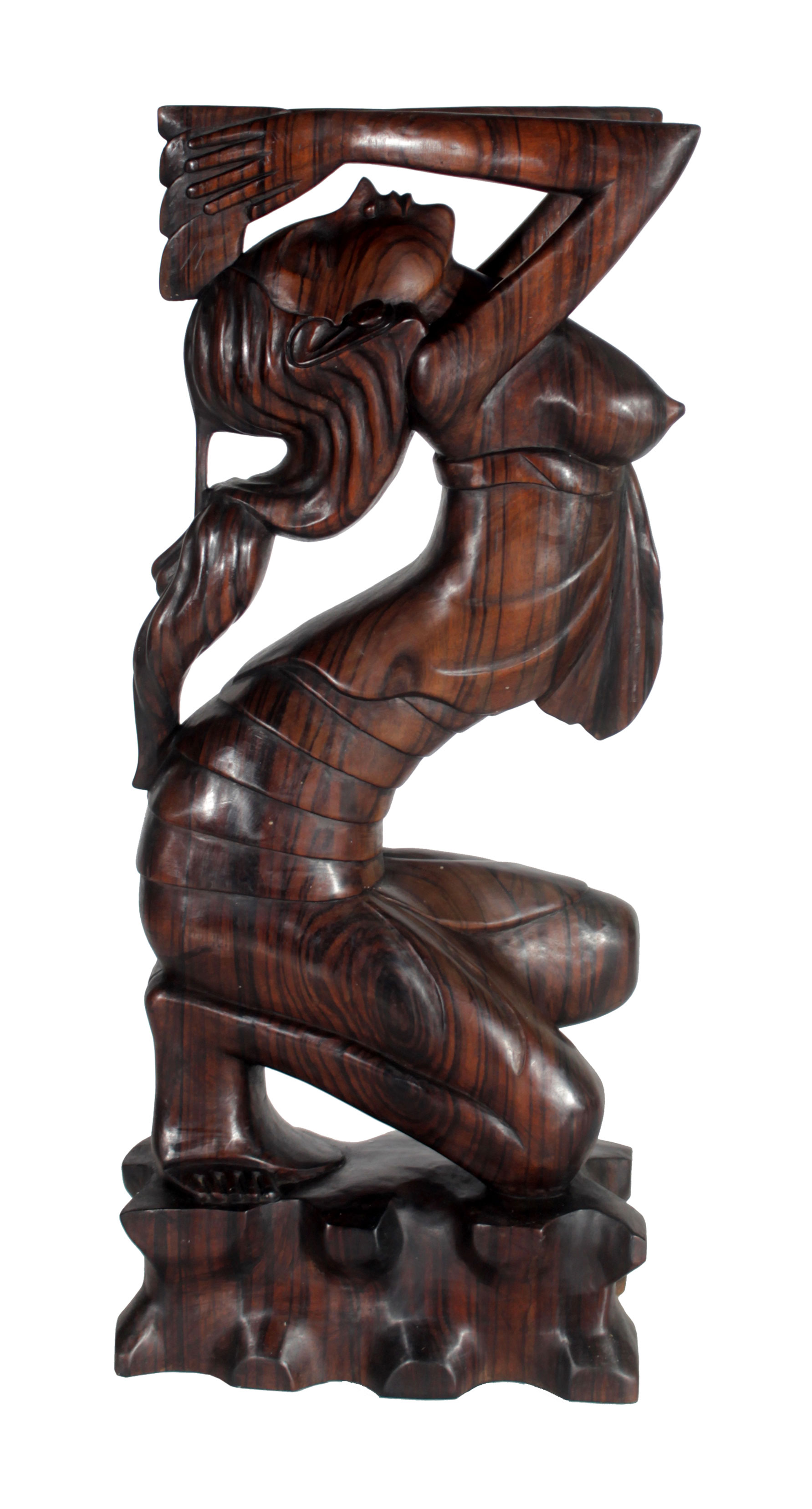 A Balinese wooden sculpture in the figure of a praying woman.