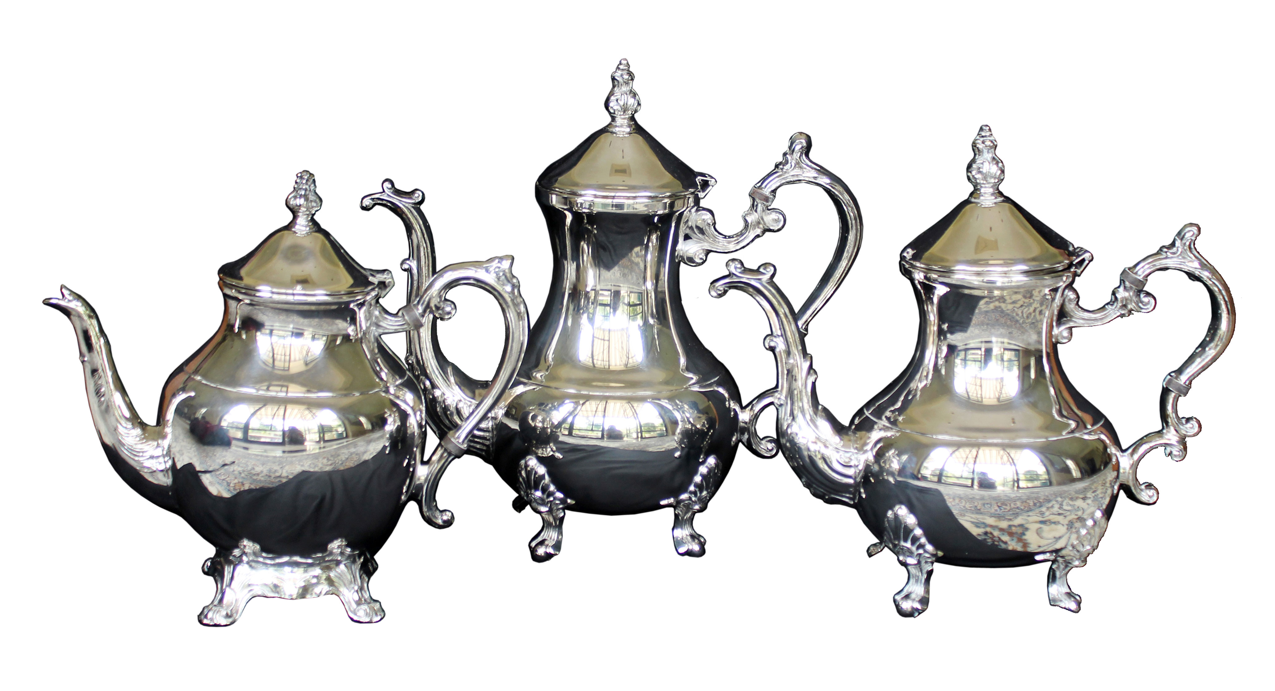 A set of three silver plated teapots with lids, stampedFB Rogers. 