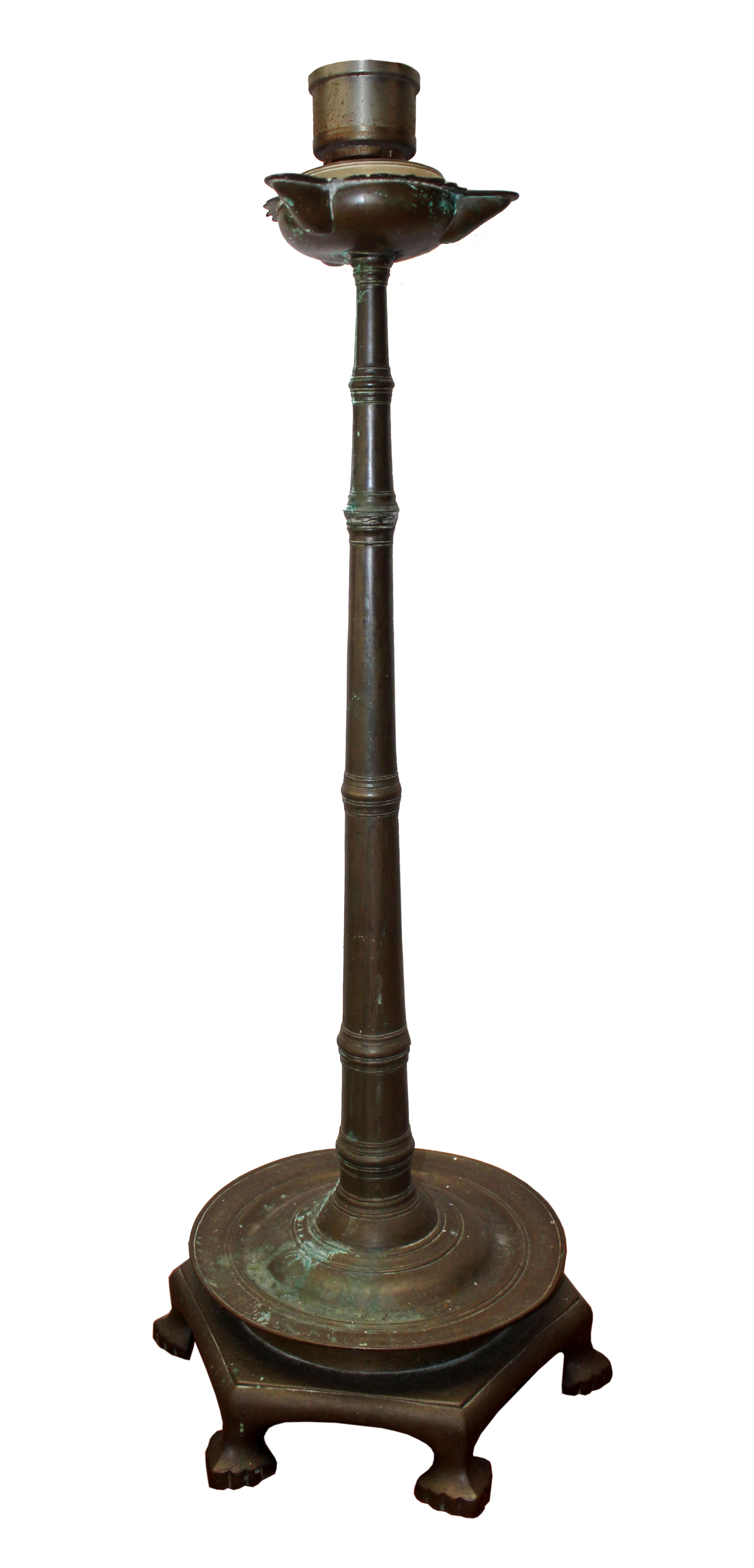 A bronze floor oil lamp. 