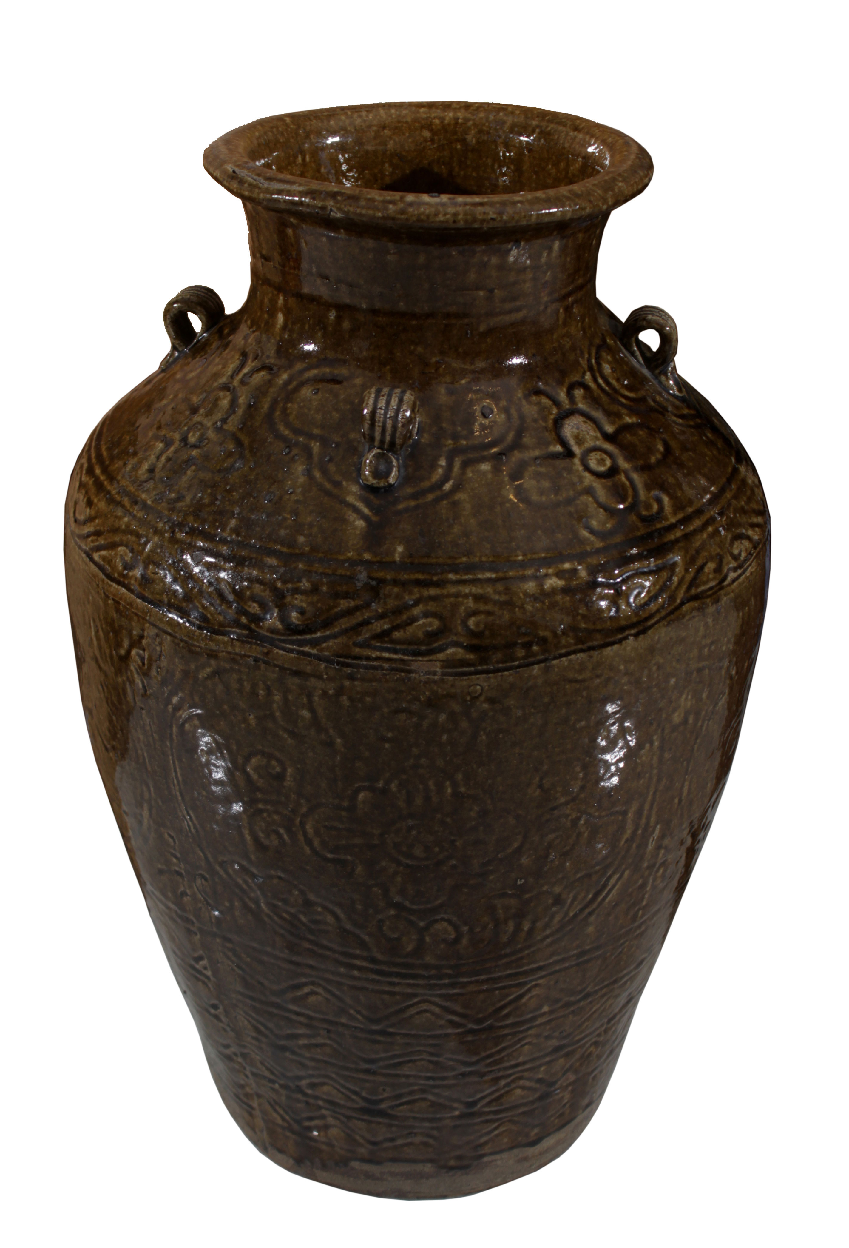 A brown glazed storage jar.