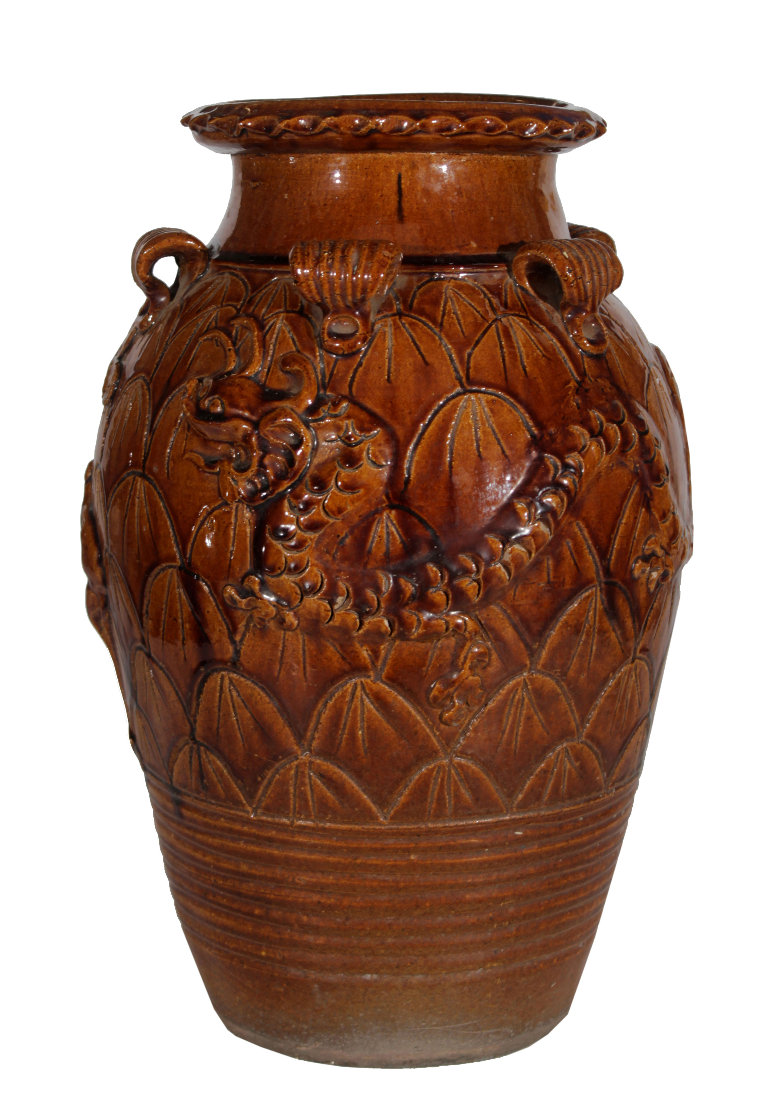 A brown glazed storage jar.