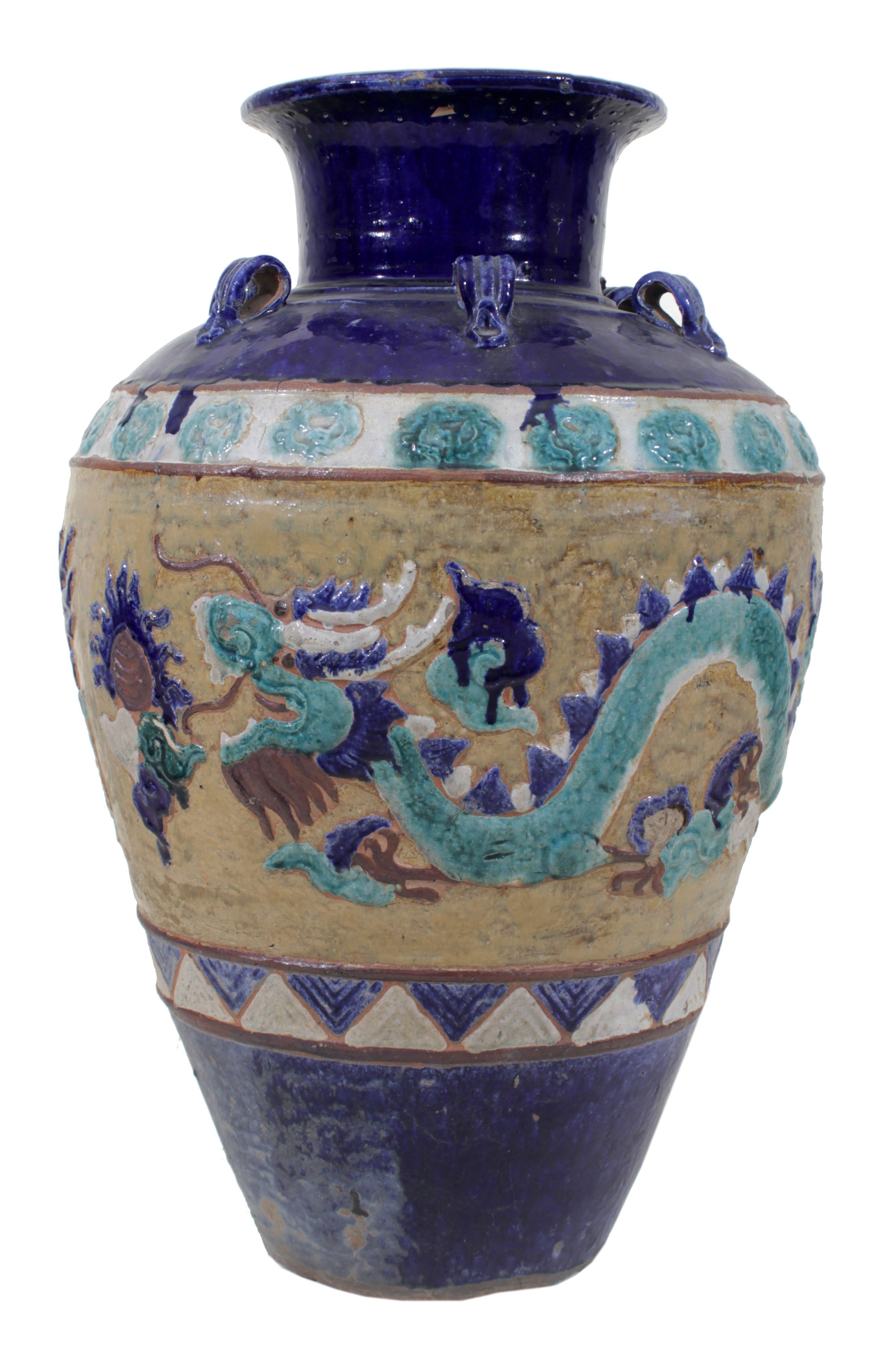 A Chinese blue glazed stoneware jar.