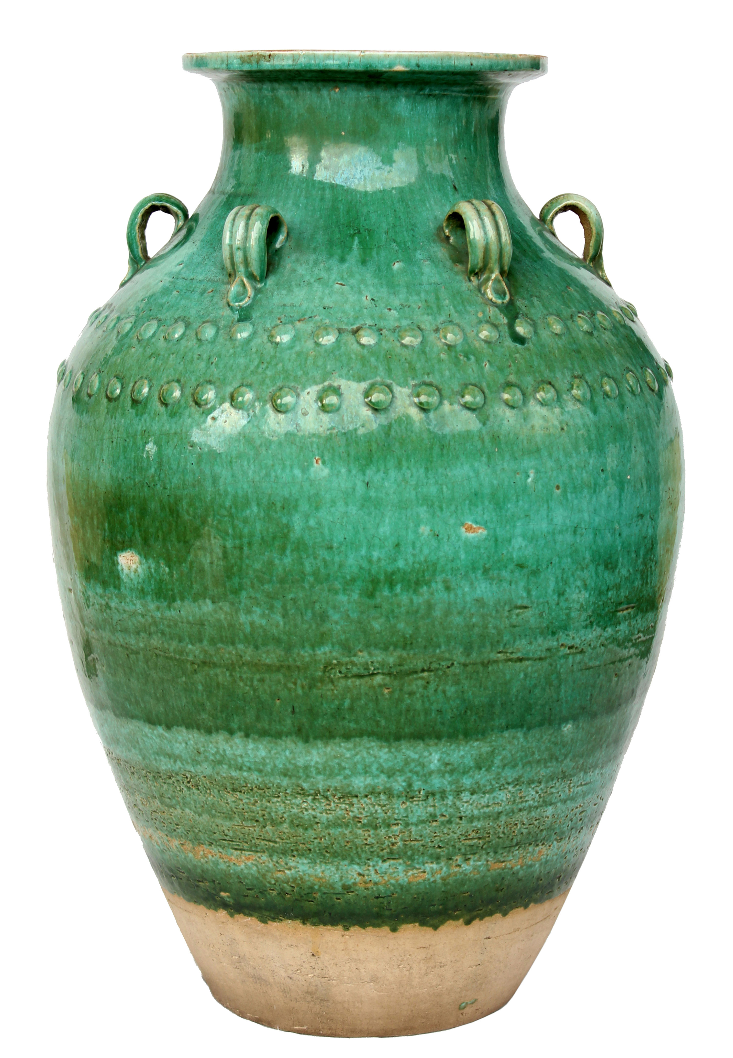 A Qing green-glazed storage jar. 