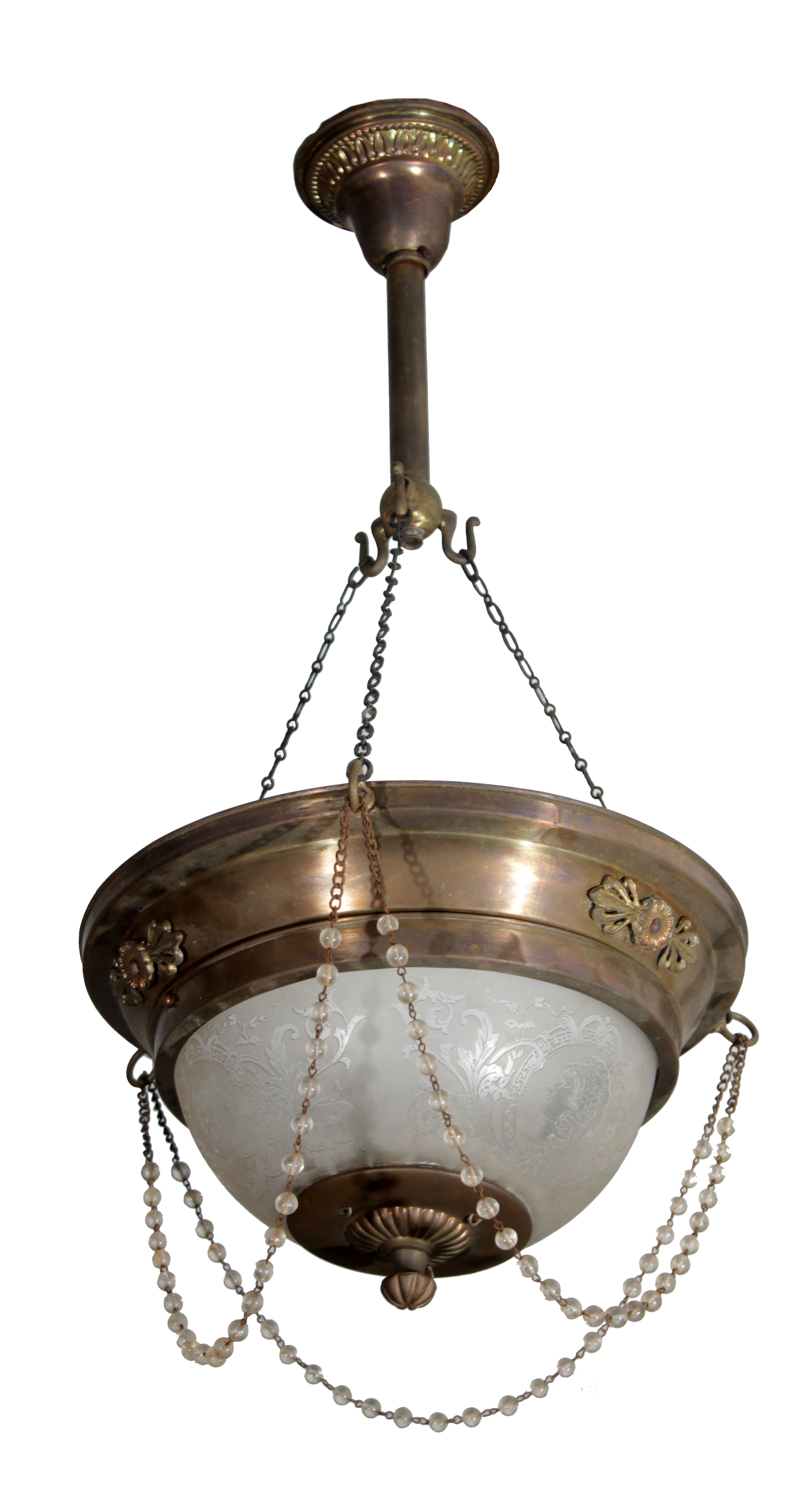 A brass hanging lamp with white glass.