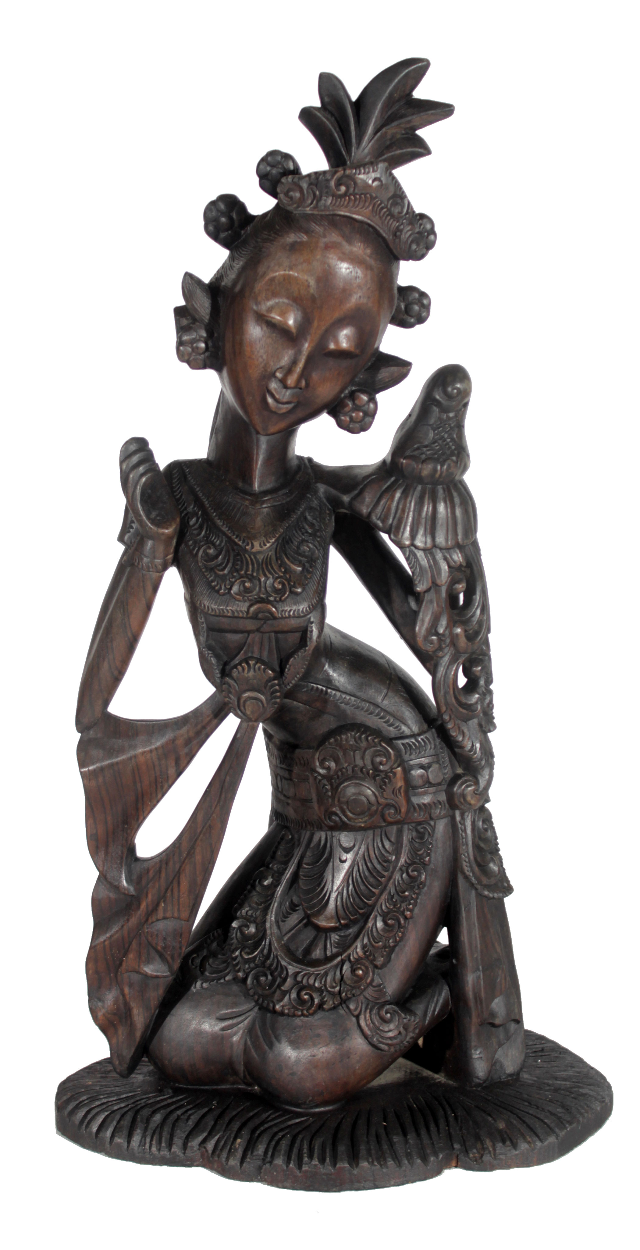 A Balinese wooden sculpture.