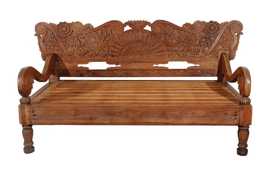 A Wooden Bench with Carved Back