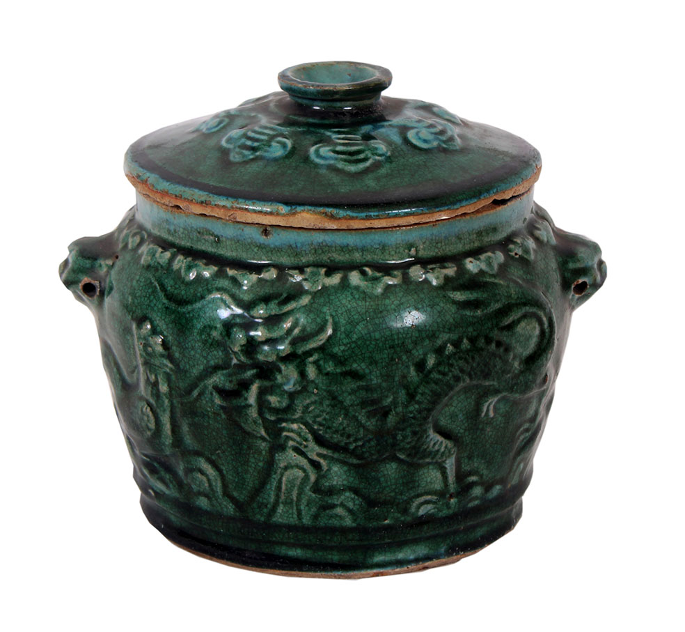 A circa 1900s green glazed shiwan covered jar