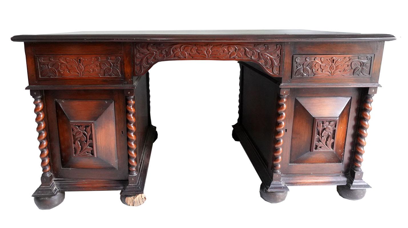 A Van der Pol carved teak wooden writing table