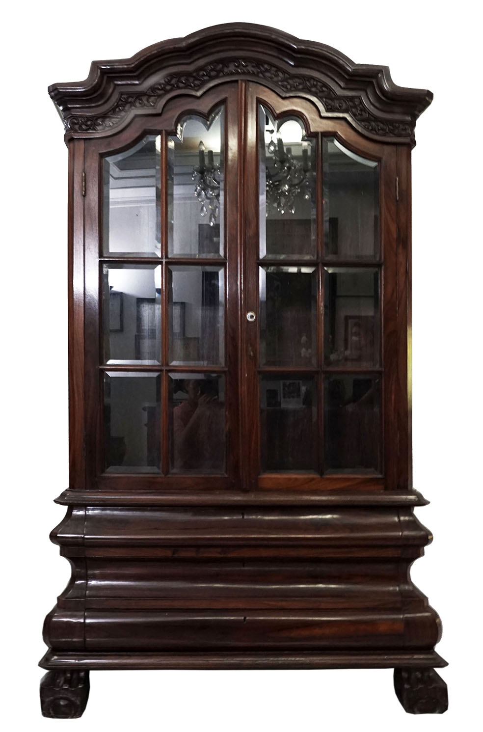 A Dutch colonial style carved wood display cabinet