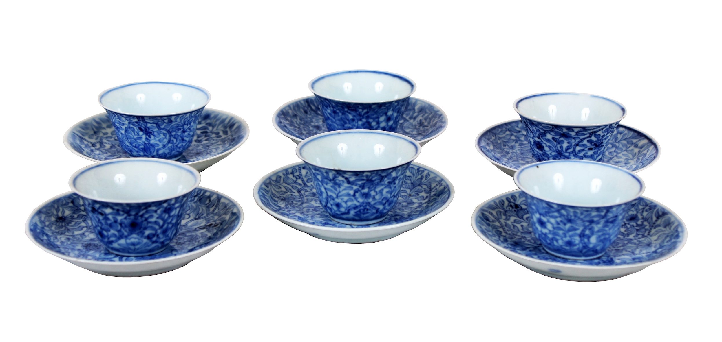 A set of six Qing Chinese blue and white cup and saucer with floral decoration