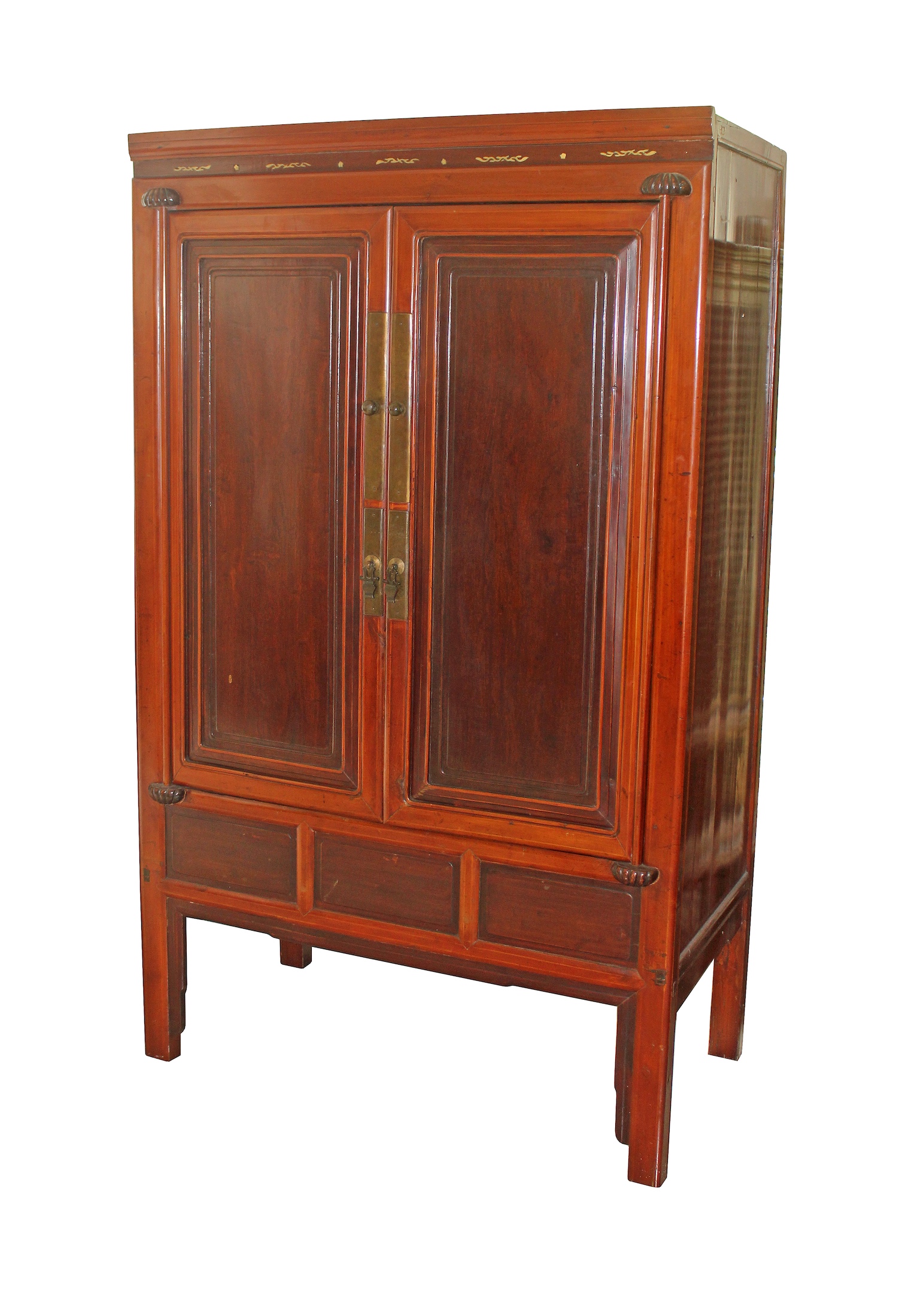 A 19th century Chinese softwood cupboard with brass mounts