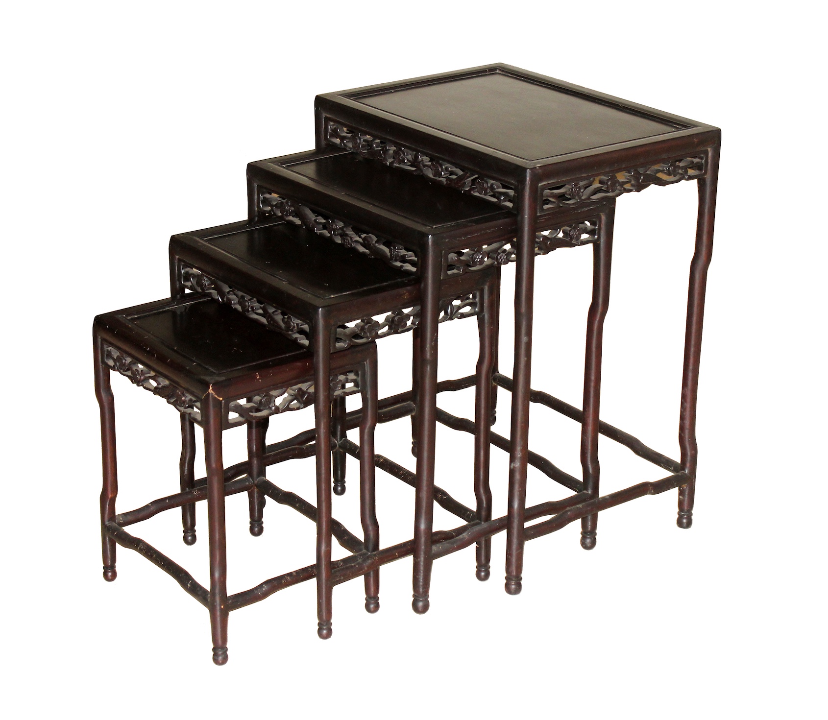 A group of four Chinese nesting wooden tables