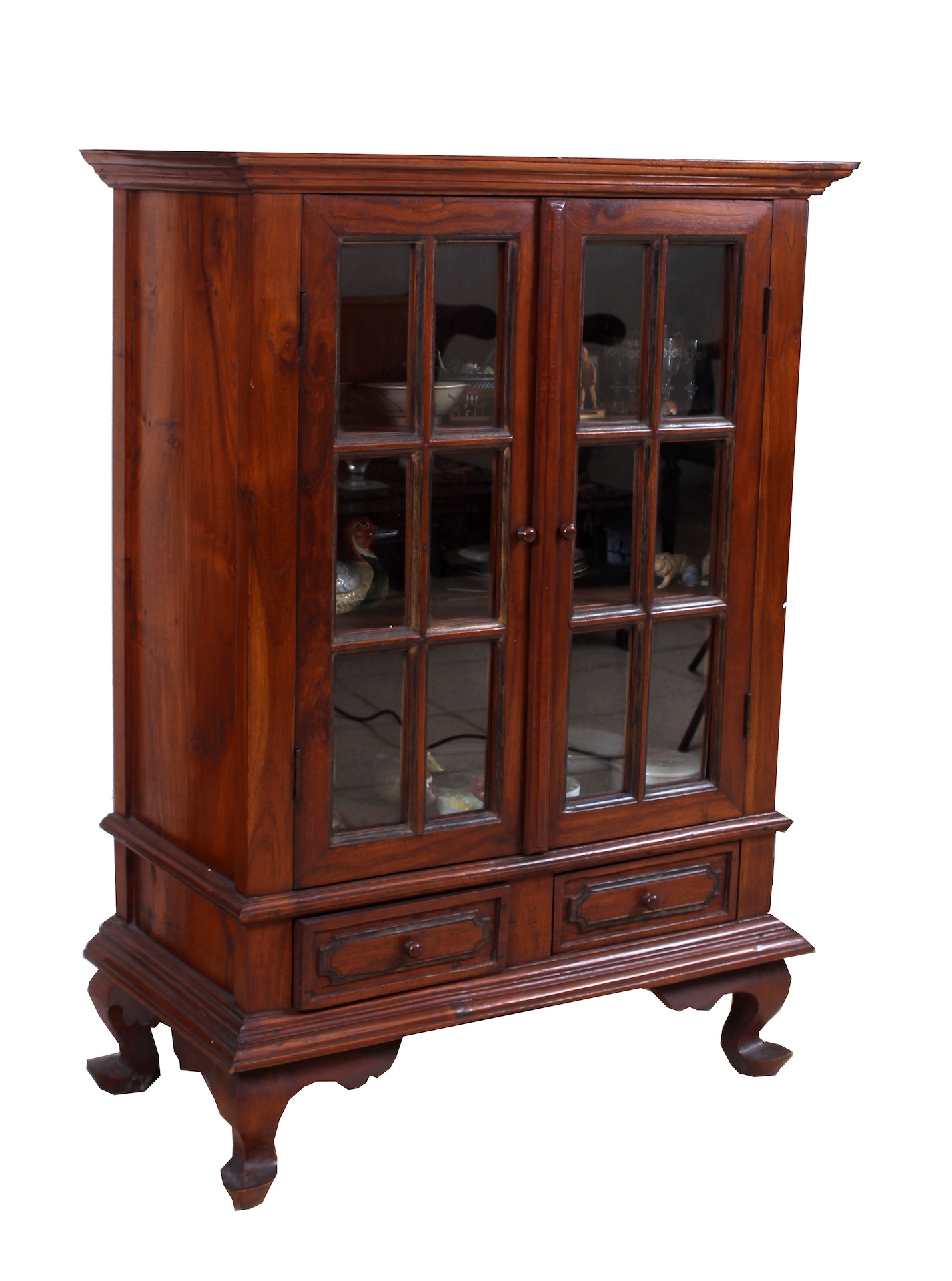 A carved wood small display cabinet