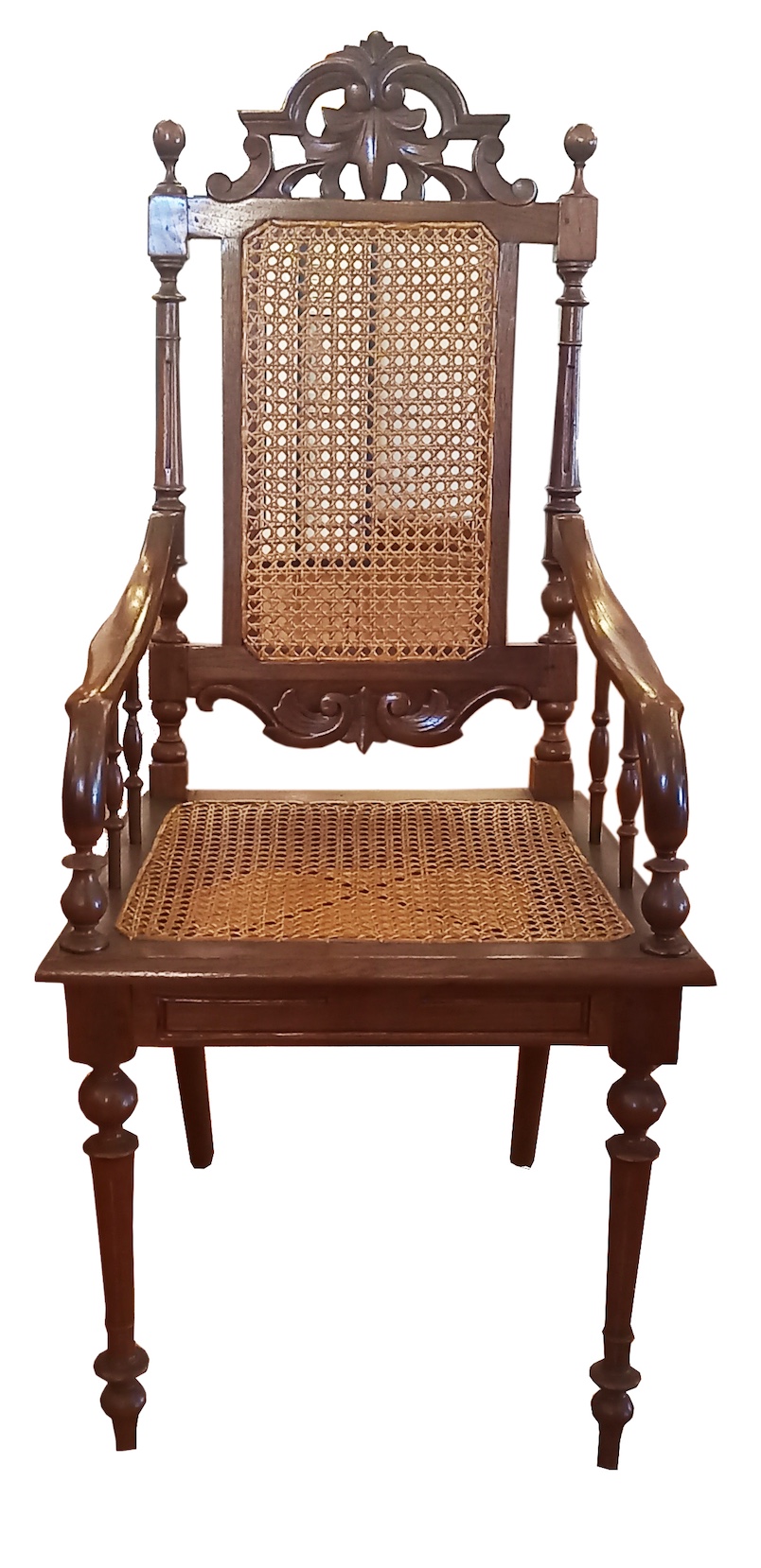 Three pieces of late 19th early 20th century carved teak arm chairs with rattan back and seat