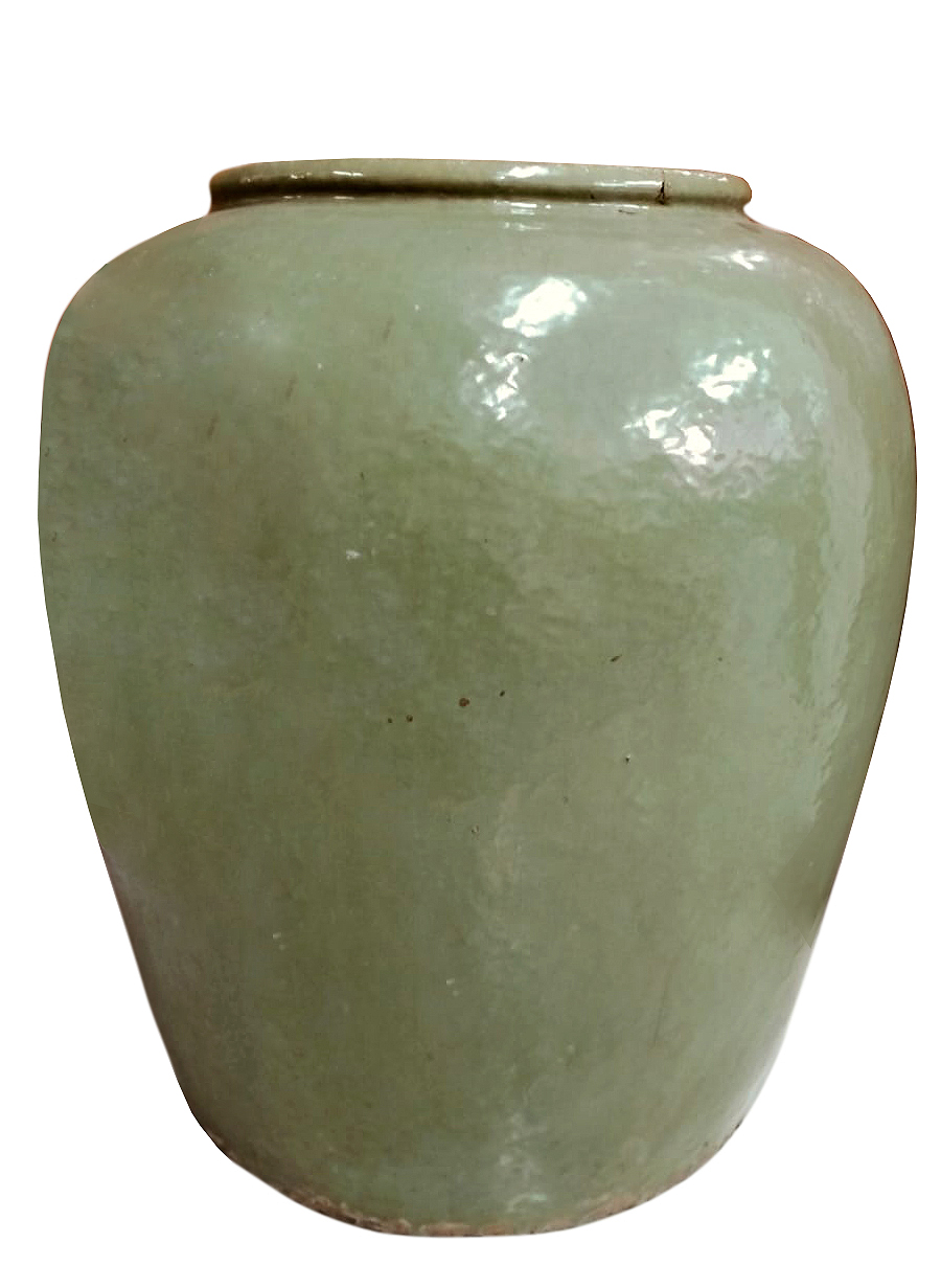 A late 19th early 20th century Chinese green glazed storage jar