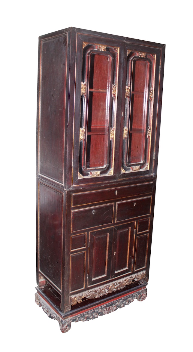 A late 19th century peranakan Chinese carved teak brown gold parfume cabinet