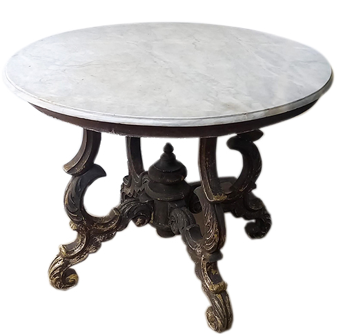A 19th early 20th century carved teak round table with marble top