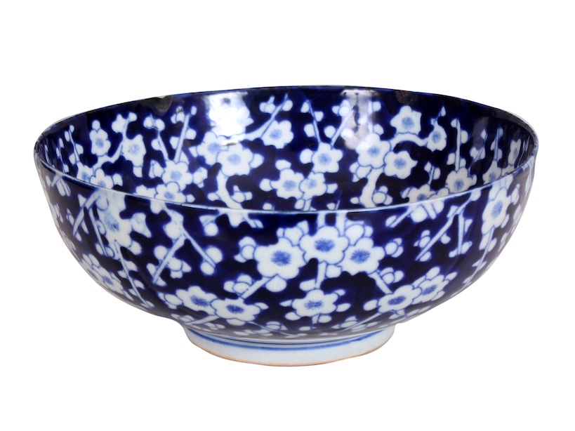 A 20th century Japanese blue and white plum blossom basin