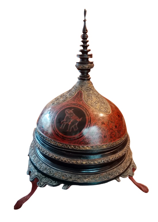 A 20th century Burmese lacquer covered jar on tripod