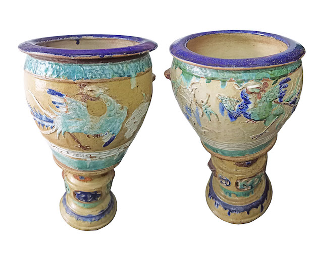 A set of two Qing 19th century Shiwan polychrome pot and stand