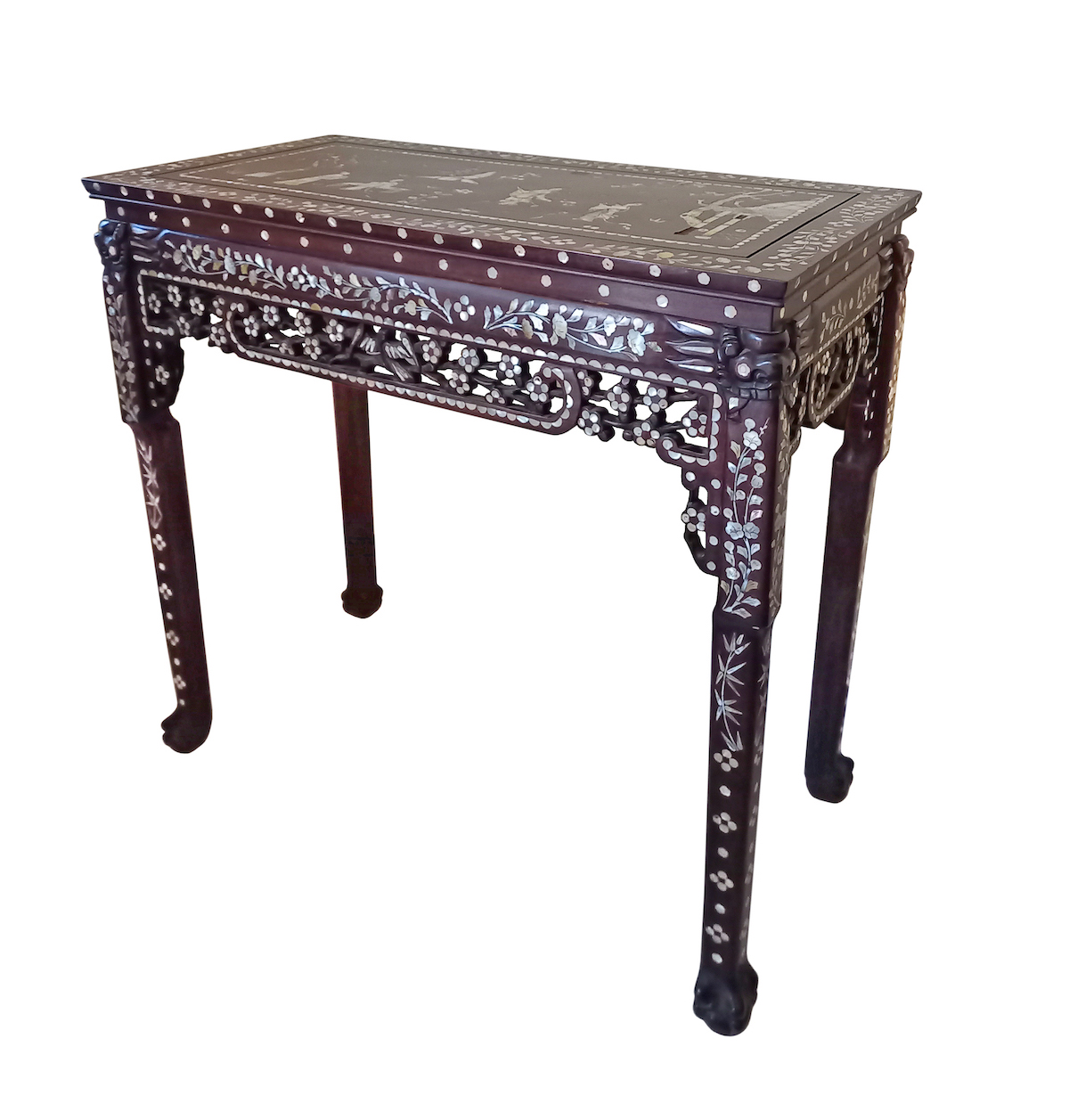 A vintage Vietnamese carved hardwood table decorated with mother of pearl inlay