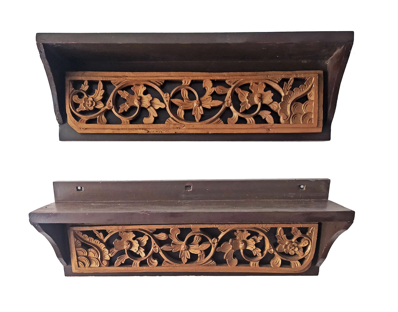 A pair of carved gilt wood wall racks