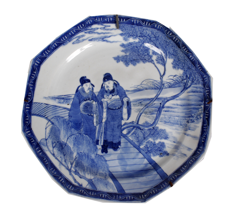 A Late Qing octagonal dish painted with two figures on bridge