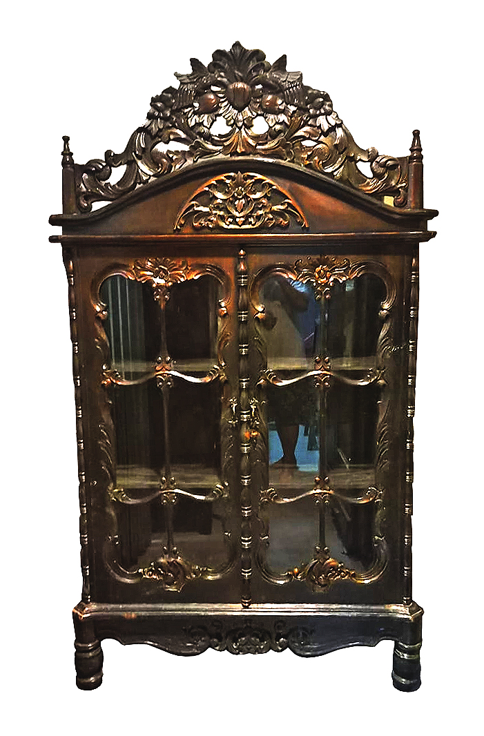 A carved teak display cabinet