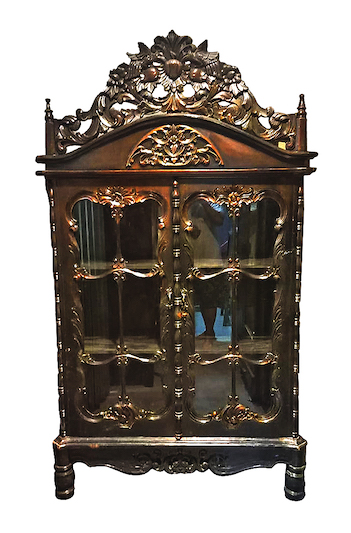 A carved teak display cabinet