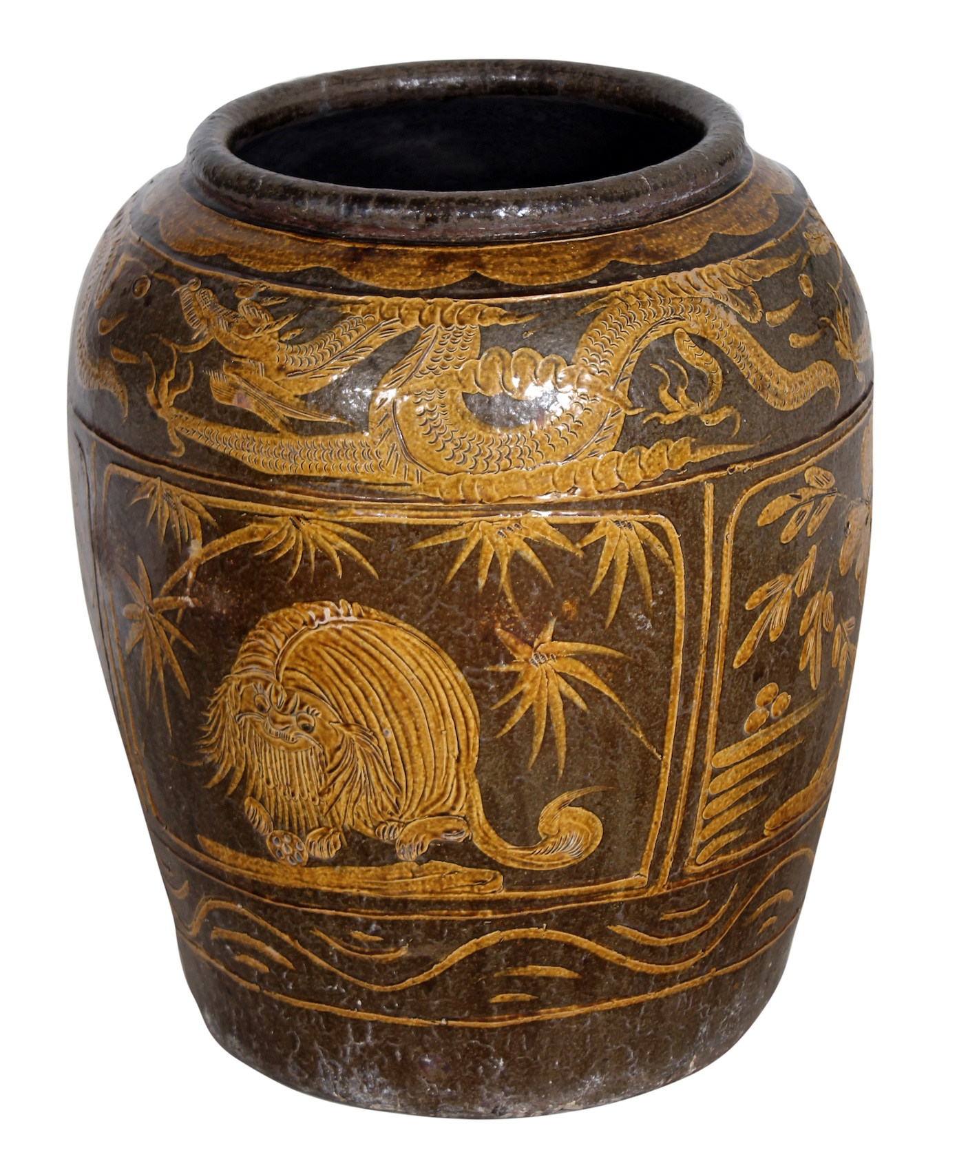 A late qing stoneware storage jar decorated with dragons and birds in yellow ochre