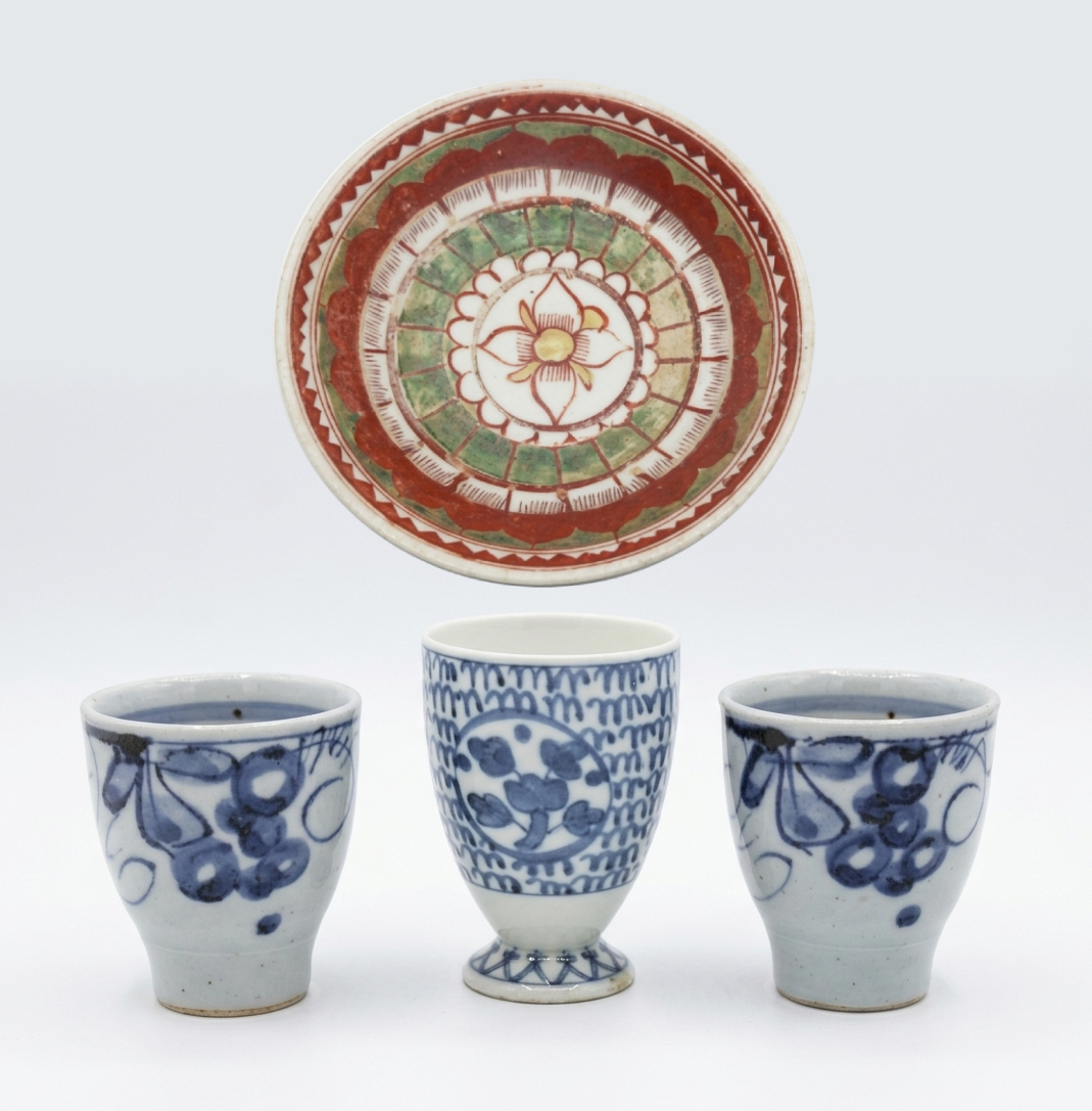 A set of four ceramic consisting of three pieces 20th century sake cups and enamelled bowl