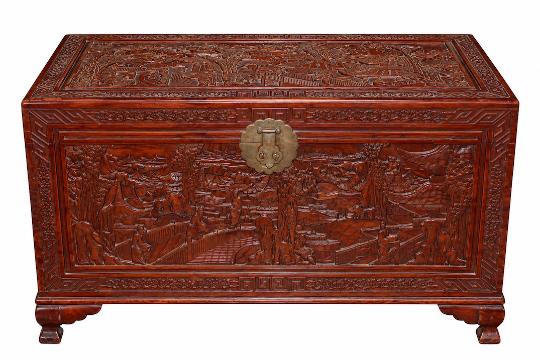 A 20th century carved camphor chest