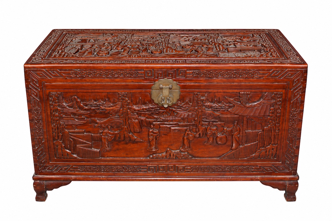 A 20th century carved camphor chest