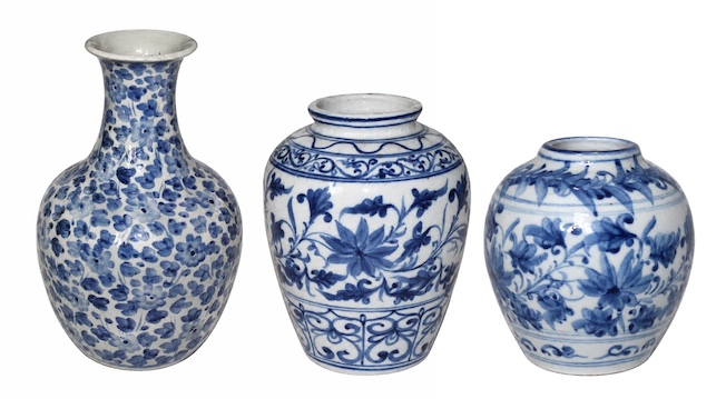 A set of three of 20th century consisting of two pieces blue and white vase painted and two jars with florals
