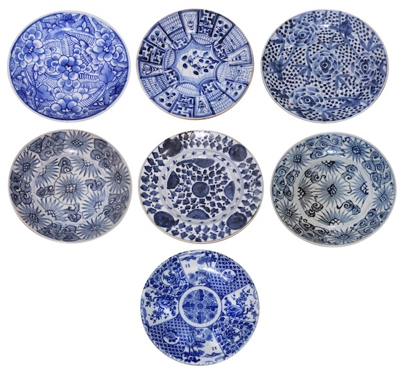 A set of seven ceramic consisting of six pieces Chinese blue and white floral plates and a Japanese blue and white printed floral plate