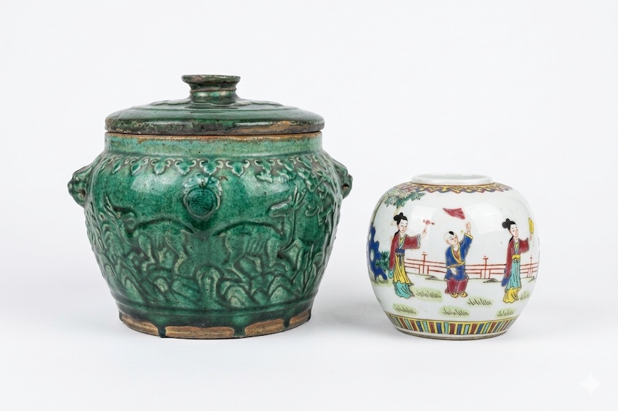 Two pieces of ceramic consisting of a late 19th early 20th century shiwan green glazed jar and a 20th century famille rose small jar painted with figures
