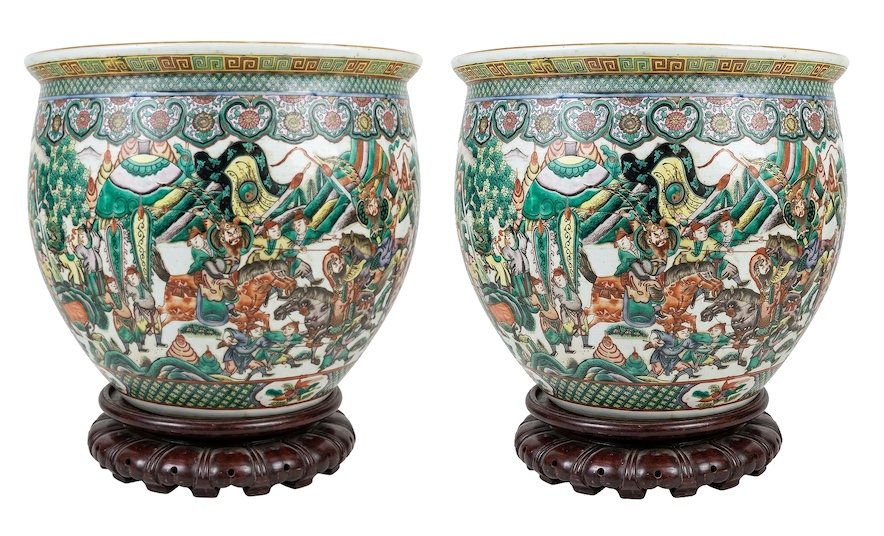 A pair of 19th to early 20th century late qing Chinese famille verte fishbowls painted with warriors and landscape the interior each painted with lotus tree and birds