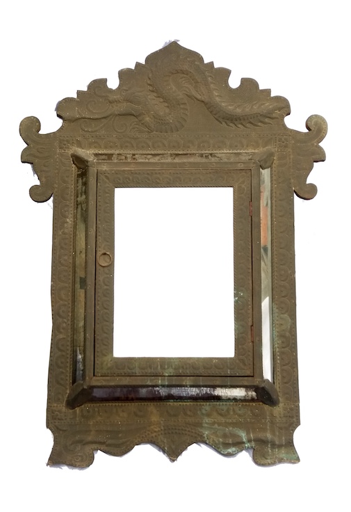 A 20th century brass wall panel cabinet with wooden panels and mirror