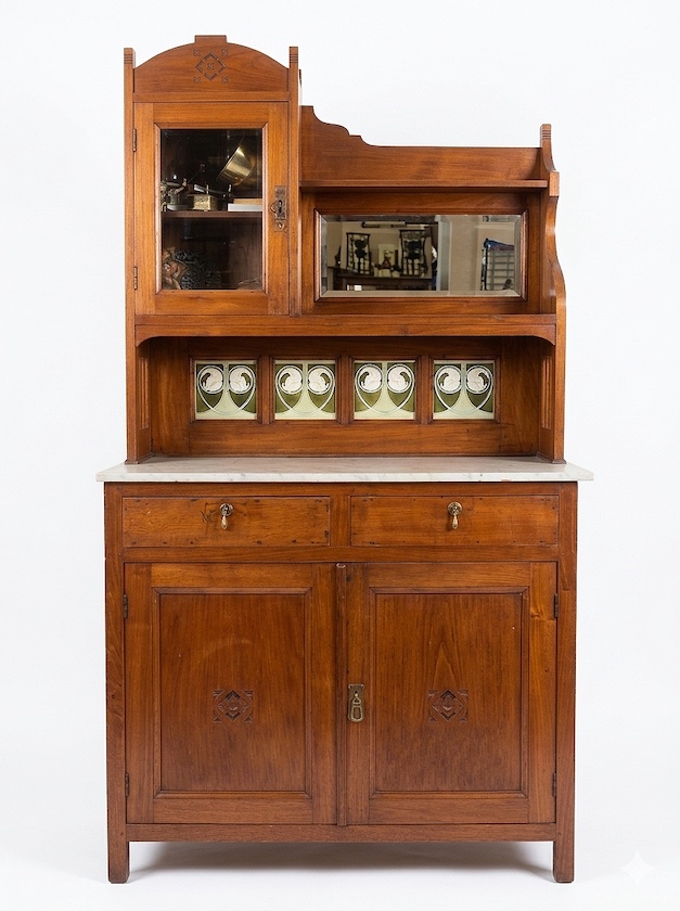 An early 20th century carved teak sideboard with ceramic tile marble and mirror