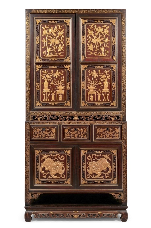 A 19th early 20th century peranakan Chinese carved teak brown and gold wondrobes