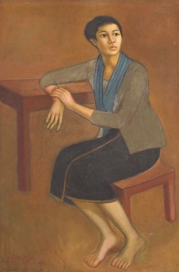 Woman Sitting at The Table