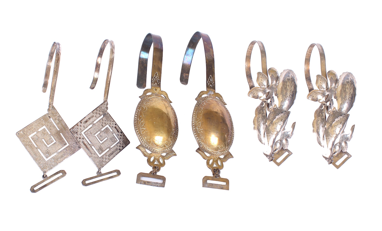 A set of six first half 20th century of silver curtain hooks