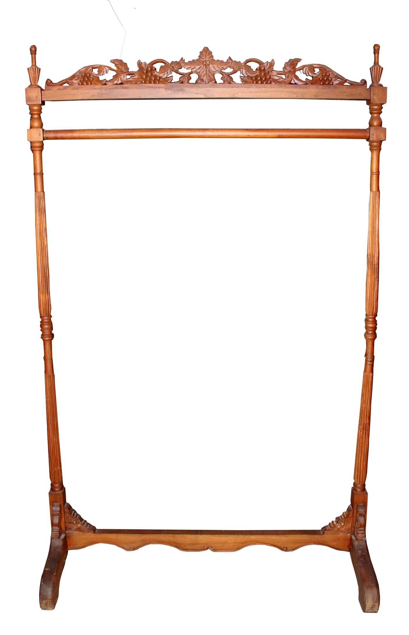 A carved teak cloth hanger