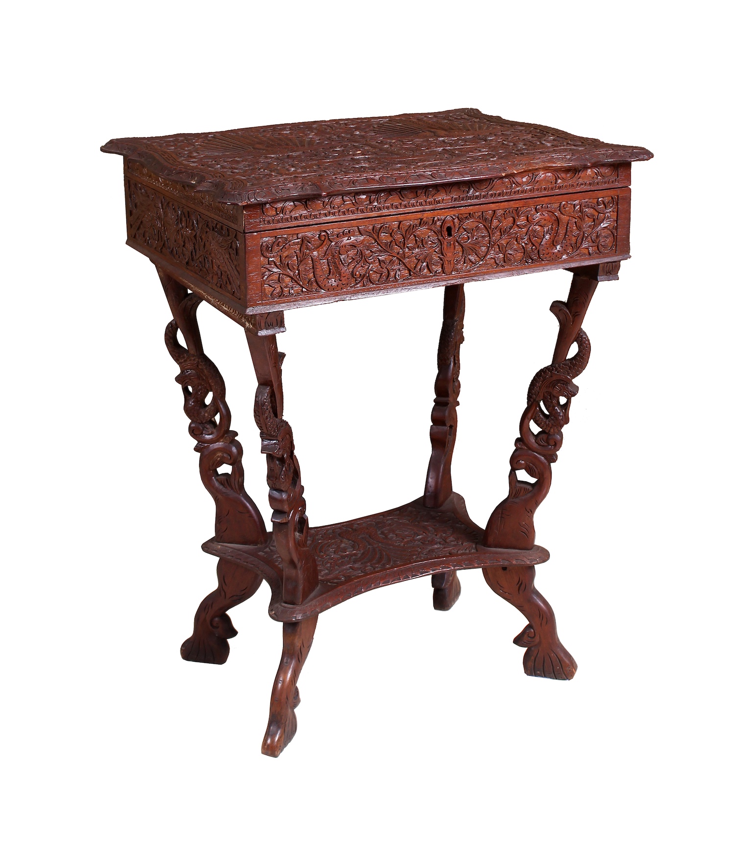 A Javanese carved teak small table with folded top circa 1950’s