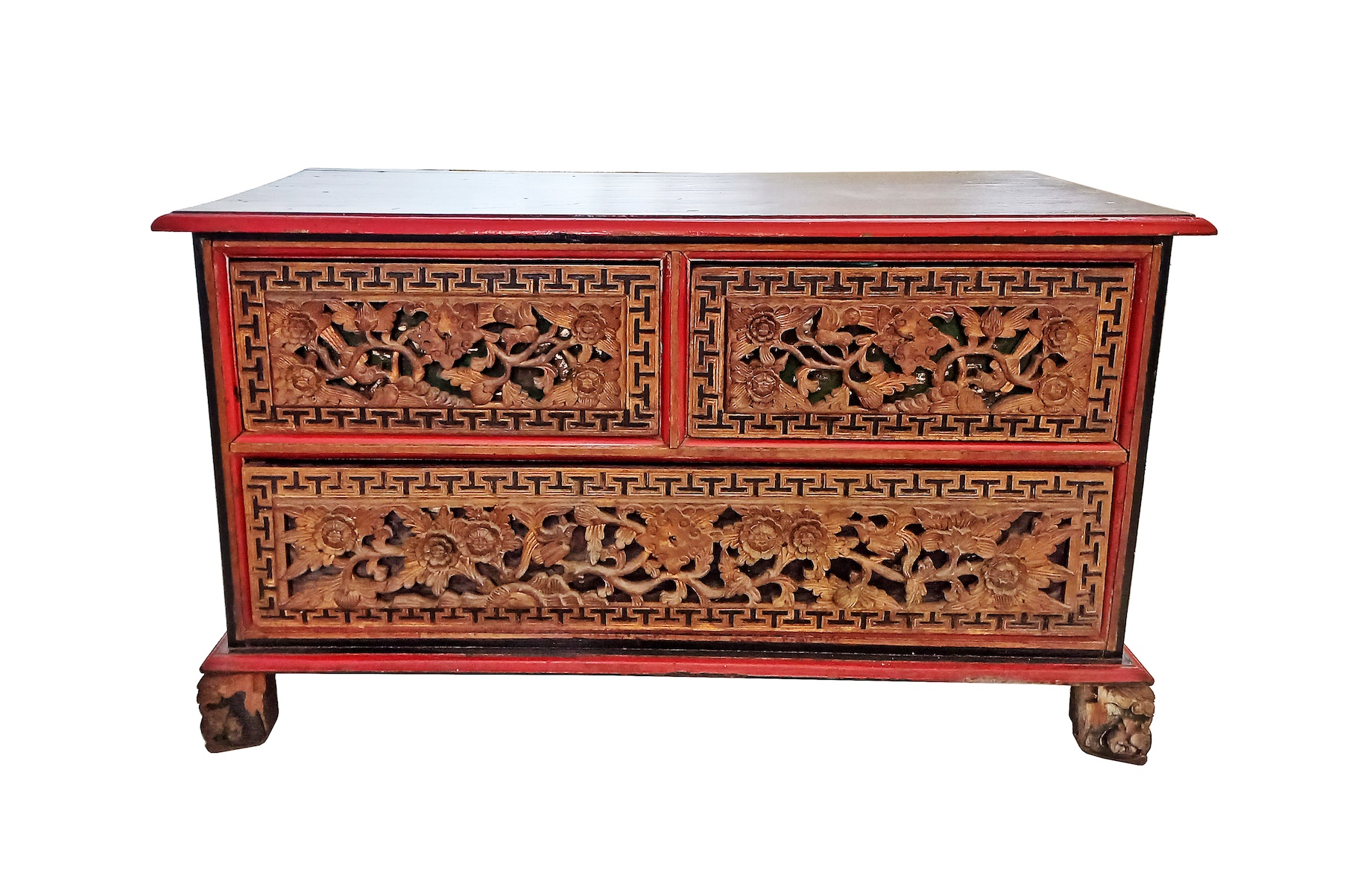 A carved gilt wood chest of drawers