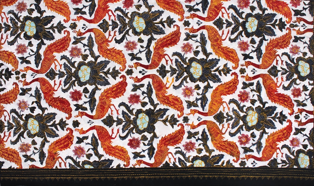 A pattern of bright red peacock with a dark blue flower pattern