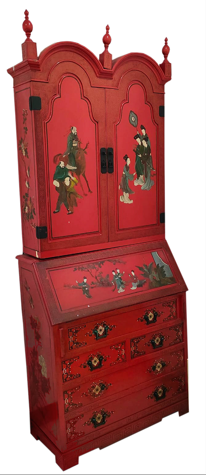 A 19th - 20th century painted red laquared bookcase with writting table