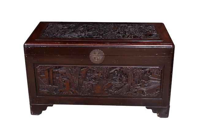 A carved camphor wood chest