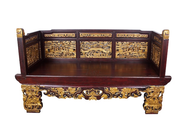 A 20th century Peranakan style carved gilt teak wood sofa